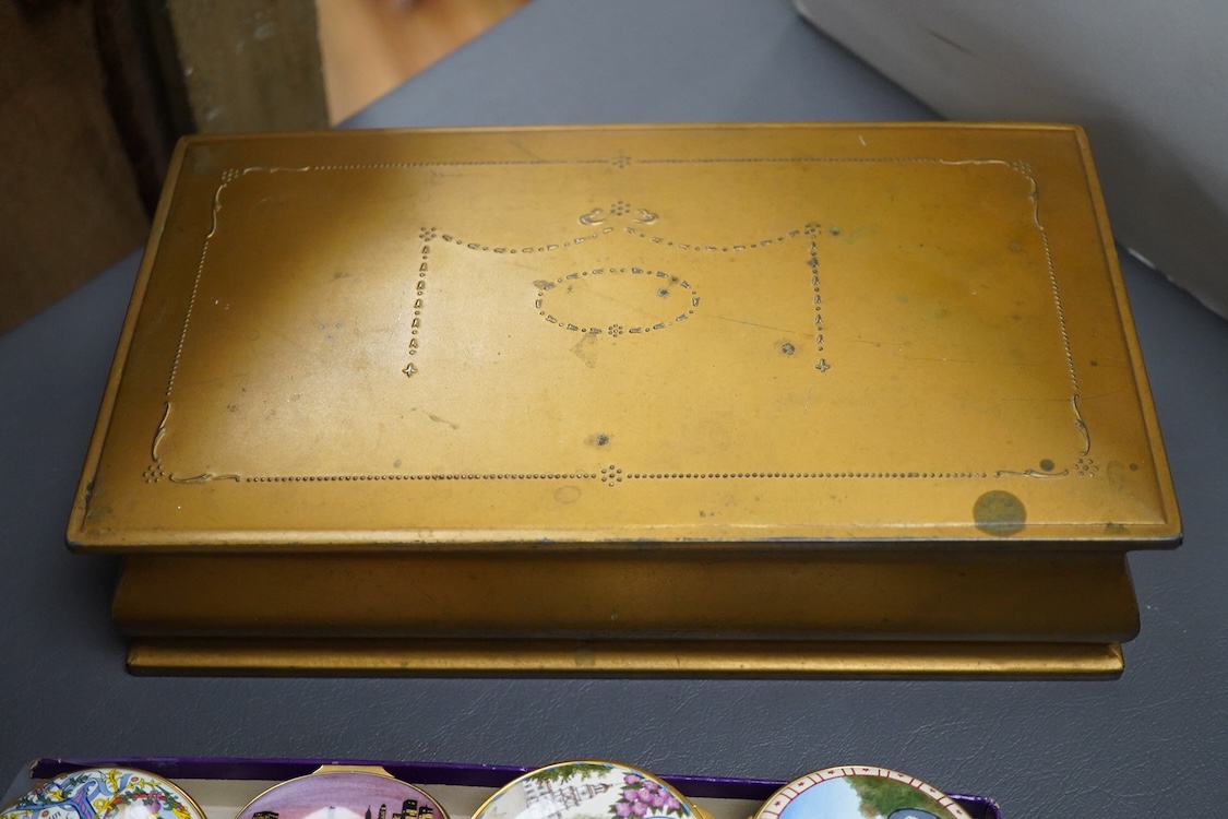 Eighteen Halcyon days enamel boxes and an enamel egg shaped box on stand
